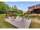 The backyard patio offers a relaxing space for outdoor gatherings, featuring comfortable seating and scenic views at 7511 Biltmore Ln, Douglasville, GA 30135