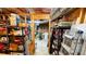Basement storage area with shelves and boxes, providing ample space for organizing and storing belongings at 7511 Biltmore Ln, Douglasville, GA 30135