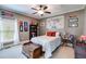 Cozy bedroom with unique decor and good natural light, creating a comfortable atmosphere at 7511 Biltmore Ln, Douglasville, GA 30135