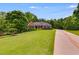 Well-maintained lawn with an attractive brick home in the background at 7511 Biltmore Ln, Douglasville, GA 30135