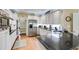Bright kitchen featuring stainless steel appliances and ample counter space at 7511 Biltmore Ln, Douglasville, GA 30135