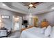 The primary bedroom suite provides a view to the attached ensuite bathroom at 7511 Biltmore Ln, Douglasville, GA 30135