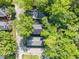 Birds eye aerial view of residential property showcasing the roof and beautiful mature green trees at 802 Chestnut Nw, Atlanta, GA 30314