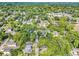 Aerial view of neighborhood showcasing mature trees, homes, and proximity to nearby shopping at 802 Chestnut Nw, Atlanta, GA 30314