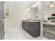 Bathroom featuring a dual sink vanity and natural light at 802 Chestnut Nw, Atlanta, GA 30314