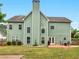 Exterior view of backyard featuring patio and lush green space at 973 Buckhorn Bnd, Locust Grove, GA 30248
