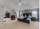 Large main bedroom featuring neutral carpet, trey ceiling with fan, and windows at 973 Buckhorn Bnd, Locust Grove, GA 30248