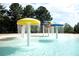 Fun splash pad with colorful mushroom-shaped water features at 973 Buckhorn Bnd, Locust Grove, GA 30248