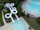 Aerial view of a winding water slide and pool at 973 Buckhorn Bnd, Locust Grove, GA 30248