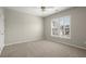 This bedroom is a blank canvas, awaiting the addition of your personal touch at 11240 Avery Cove Ct, Alpharetta, GA 30022