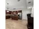 This kitchen is equipped with modern appliances, granite countertops, and a kitchen island at 11240 Avery Cove Ct, Alpharetta, GA 30022
