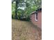 The backyard features a neighboring building at 2545 Saint Patrick Se St, Atlanta, GA 30317