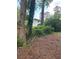 The backyard features mature trees that create a private outdoor space at 2545 Saint Patrick Se St, Atlanta, GA 30317
