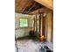 Interior image showing an under-renovation room with exposed studs, and a window at 2545 Saint Patrick Se St, Atlanta, GA 30317