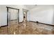 Bedroom boasting marble floors and a mirrored closet, offering both style and functionality at 2711 Mcdonough Rd, Hampton, GA 30228
