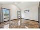 Spacious bedroom featuring high ceilings, multiple windows, and stylish marble flooring at 2711 Mcdonough Rd, Hampton, GA 30228