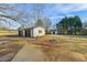 Detached two car garage with a private driveway at 2711 Mcdonough Rd, Hampton, GA 30228