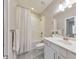 Clean bathroom with tub and shower combination with modern vanity, and updated fixtures at 396 Summerhour St, Marietta, GA 30060