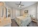 This bedroom is equipped with hardwood floors, a ceiling fan, and two closets at 396 Summerhour St, Marietta, GA 30060