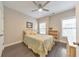 Comfortable bedroom with natural light, ceiling fan and hardwood floors at 396 Summerhour St, Marietta, GA 30060