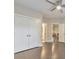 Spacious bedroom with ceiling fan and walk-in closet access to ensuite bath at 396 Summerhour St, Marietta, GA 30060