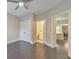 View of bedroom with hardwood floors that leads to a bathroom and office at 396 Summerhour St, Marietta, GA 30060