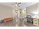 Versatile bonus room with dark hardwood floors and built-in desk, great for study, work, or play at 396 Summerhour St, Marietta, GA 30060