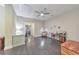 Spacious bonus room featuring built-in desk, a sewing machine station and lots of natural light at 396 Summerhour St, Marietta, GA 30060