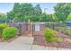 Community dog park with secure fencing and open space for pets to play at 396 Summerhour St, Marietta, GA 30060