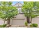 Charming two-story home with a brick facade and a well-manicured front yard at 396 Summerhour St, Marietta, GA 30060