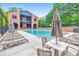 Resort style pool with lounge seating and covered patio area at 396 Summerhour St, Marietta, GA 30060