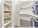 Walk-in closet with custom shelving and hardwood floors providing ample storage space at 396 Summerhour St, Marietta, GA 30060