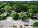 Aerial view of homes with mature, lush trees lining the streets in a quiet neighborhood at 511 Robinson Se Ave, Atlanta, GA 30315