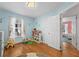 Charming ' room features hardwood floors, a whimsical decor and ample natural light at 511 Robinson Se Ave, Atlanta, GA 30315