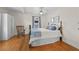 Comfortable bedroom featuring hardwood floors and a cozy rocking chair at 511 Robinson Se Ave, Atlanta, GA 30315