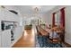 Bright dining room featuring hardwood floors and a view into the living room at 511 Robinson Se Ave, Atlanta, GA 30315