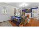 Comfortable living room featuring hardwood floors and a white framed entryway at 511 Robinson Se Ave, Atlanta, GA 30315