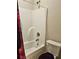 Bathroom featuring toilet and shower with neutral accents at 8315 Loch Lomand Ln, Winston, GA 30187