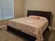Comfortable bedroom featuring soft natural light, plush carpet, and neutral decor at 8315 Loch Lomand Ln, Winston, GA 30187