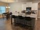 Beautiful kitchen with white cabinets, granite countertops, and stainless steel appliances at 8315 Loch Lomand Ln, Winston, GA 30187