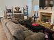 Inviting living room with a stone fireplace and plush seating at 8315 Loch Lomand Ln, Winston, GA 30187
