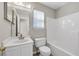Bathroom featuring a white vanity, toilet and shower at 3504 Benthollow Ln, Duluth, GA 30096
