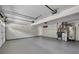 Spacious garage with room for storage and epoxy flooring at 3504 Benthollow Ln, Duluth, GA 30096