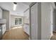 Bright kitchen featuring stainless appliances, granite counters, hardwood floors, and a double door pantry at 3504 Benthollow Ln, Duluth, GA 30096
