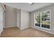 Bright living room featuring neutral walls and luxury vinyl plank flooring at 3504 Benthollow Ln, Duluth, GA 30096