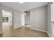Spacious living room with staircase access and lots of natural light at 3504 Benthollow Ln, Duluth, GA 30096