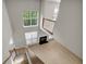 Living room featuring hardwood floors, a fireplace, and a large window at 3504 Benthollow Ln, Duluth, GA 30096