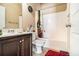 Bathroom showing a vanity sink and shower with bright curtain at 3621 Guinevere Trce, Douglasville, GA 30135