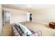 Spacious bedroom features neutral carpet, adjoining walk-in closet, and ample room for seating at 3621 Guinevere Trce, Douglasville, GA 30135