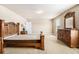 Bedroom showcasing wooden furniture and a bright double window at 3621 Guinevere Trce, Douglasville, GA 30135